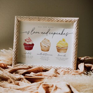 Modern wedding cupcake sign featuring red velvet, vanilla buttercream, and lemon cake options. A charming addition to a dessert spread.