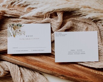 Pode incluir: Um cartão RSVP branco com um design floral e o texto "RSVP" e "Por favor, responda até o primeiro de março". O cartão tem duas opções para os convidados escolherem: "aceita com prazer" e "recusa com pesar".