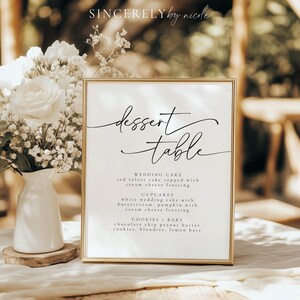 Minimalist dessert table sign with a refined script, detailing a selection of sweets including red velvet cake, cupcakes, and cookies. Ideal for weddings, celebrations, or upscale gatherings looking for a polished presentation.