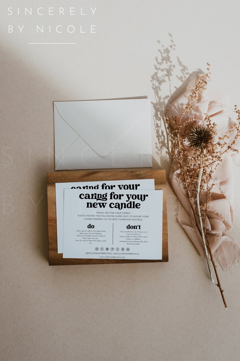 May include: A white card with black text that reads "caring for your new candle". The card is on a wooden surface and includes instructions on how to care for a candle. The text includes "do" and "don't" lists with instructions on how to properly care for a candle.