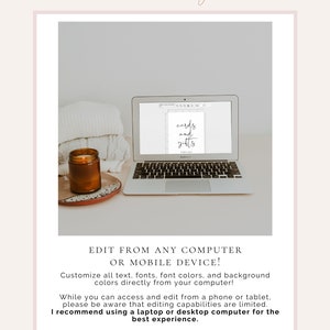 May include: A laptop computer screen displaying a digital design for a sign that reads "cards and gifts". The laptop is on a white surface with a brown candle and a white blanket.