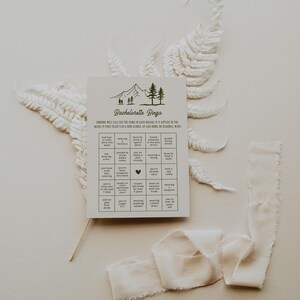 A nature-inspired bachelorette bingo card styled with soft beige tones and delicate fabric accents. Featuring a neutral color palette and fun-filled prompts, this game is ideal for low-key yet stylish bridal celebrations.
