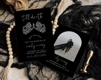 May include: Black and white save the date cards with a skeleton hand design. The text reads "till death" and "save the date for the wedding of emily + cory" with the date and location. The second card has a photo of a couple on a beach with the text "emily + cory" and the date.