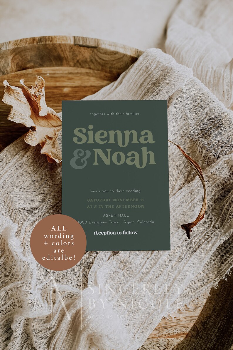 May include: A green wedding invitation with the text "Sienna & Noah" in a retro font. The invitation details the wedding date, time, and location at Aspen Hall in Aspen, Colorado. The text "reception to follow" is also included. The invitation is surrounded by a brown wooden surface and a beige fabric.