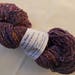 Handspun Organic Falkland Merino wool - 107 gram - blend of blue, purple, red, yellow, orange and white
