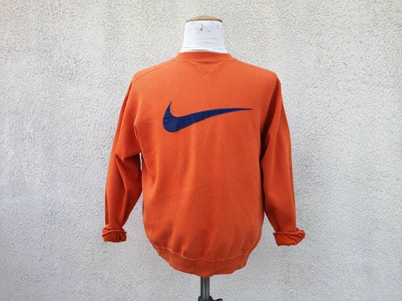 orange nike sweater