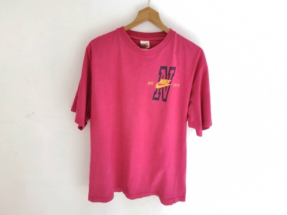 light pink nike t shirt