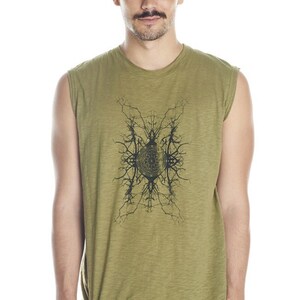 May include: A sleeveless olive green t-shirt with a black graphic print of a geometric design. The design features a circle with a pattern inside and branches extending outward.