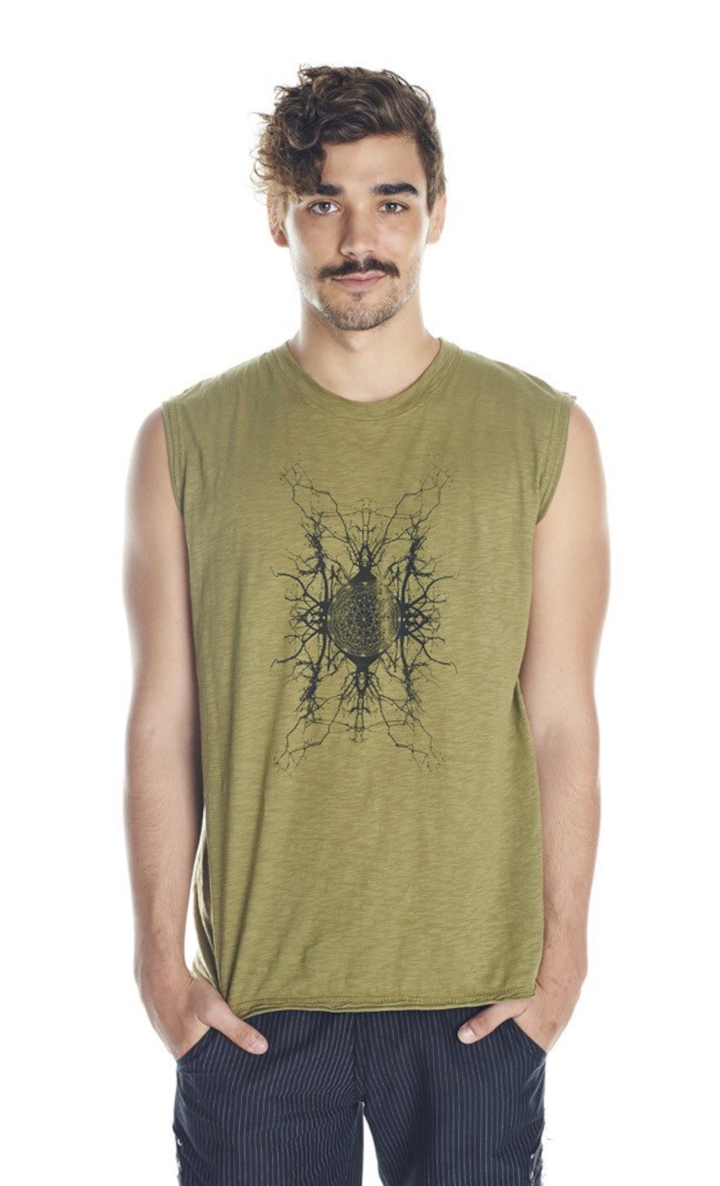 May include: A sleeveless olive green t-shirt with a black graphic print of a geometric design. The design features a circle with a pattern inside and branches extending outward.