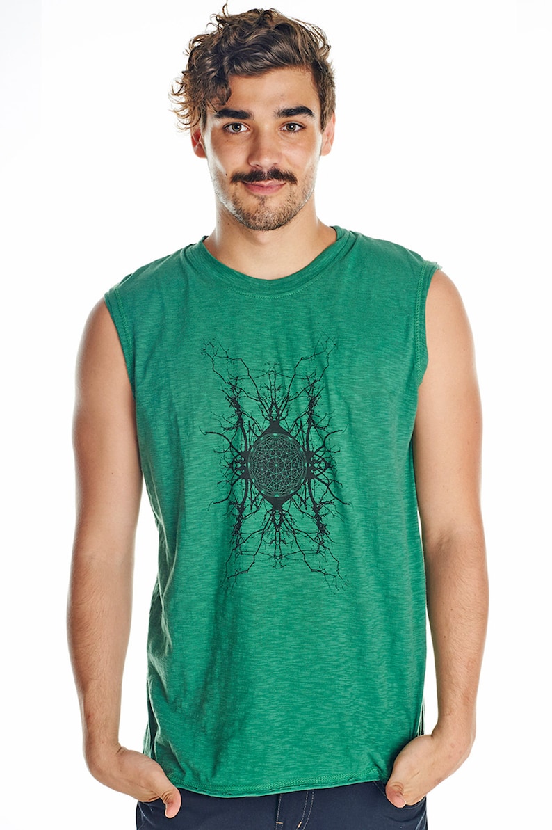 May include: A green sleeveless shirt with a black graphic print of a circular design with branches extending outward.