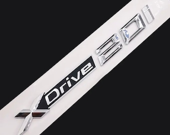 Insigne BMW XDrive 20i, porte latérale de coffre arrière chromée argentée - Packs simple/jumeau Royaume-Uni