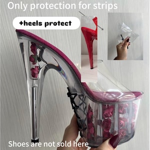May include: Clear plastic shoe protector for high heels with red rose inserts. Text reads: Only protection for strips +heels protect. Shoes are not sold here I use the shoes for demonstration. Includes a small transparent plastic cover for the heel.