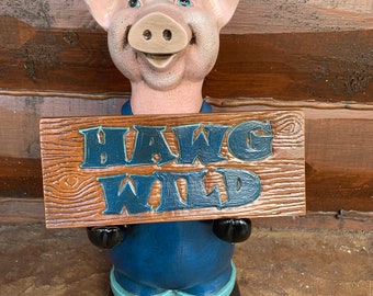 Hawg Wild Pig Holding Sign