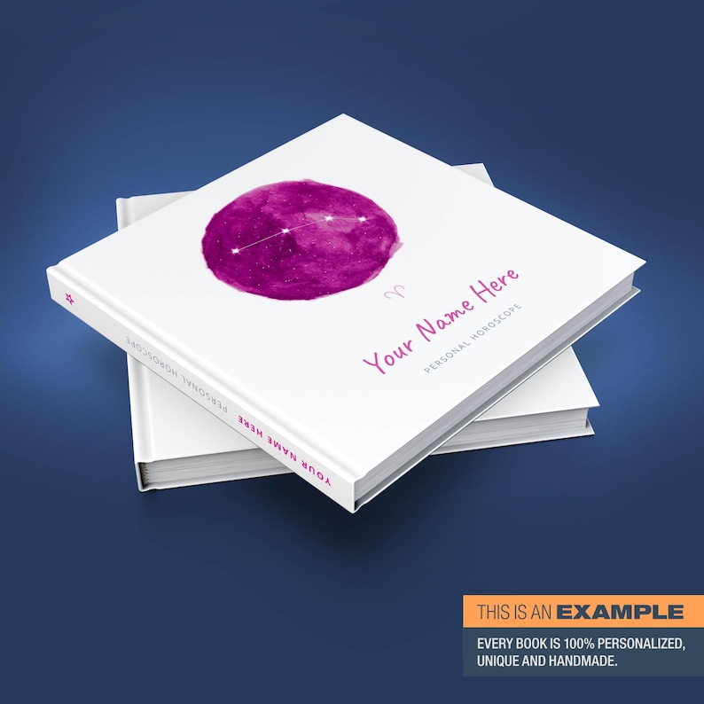 May include: A personalized horoscope book with a pink watercolor illustration of the Aries constellation. The book cover features the text "Your Name Here" and "Personal Horoscope".