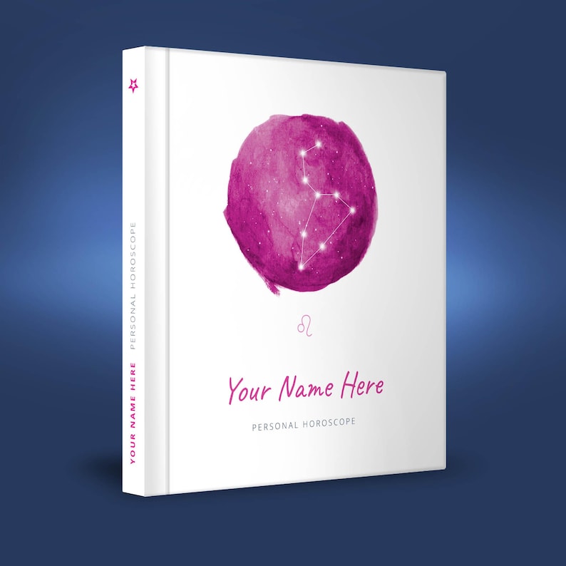 May include: A white book with a pink watercolor illustration of the Leo constellation. The book has the text "Your Name Here" and "Personal Horoscope" printed on the cover.
