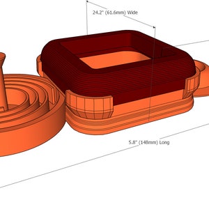K&ouml;nnte beinhalten: Ein 3D-gedrucktes Objekt in Orange und Rot mit quadratischer Basis und kreisf&ouml;rmiger Oberseite. Die quadratische Basis hat einen roten Innenraum und die kreisf&ouml;rmige Oberseite einen kleinen Turm in der Mitte. Das Objekt ist 14 cm lang, 61,5 cm breit und 2,5 cm hoch.