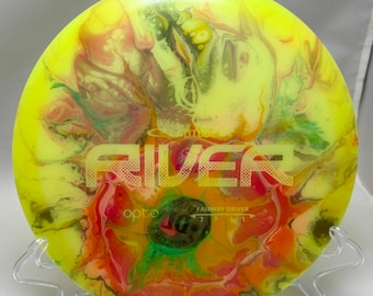 Latitude 64 River dyed disc golf disc, Opto Glow Moonshine plastic, 7 7 -1 1 , 174 grams, lightly used condition.