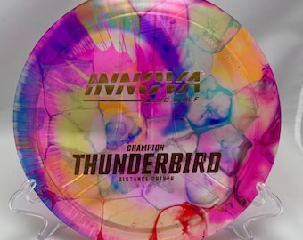 Innova Thunderbird dyed disc golf disc, Champion plastic, 9 5 0 2 , 173.5 grams, used condition, some scuffing.