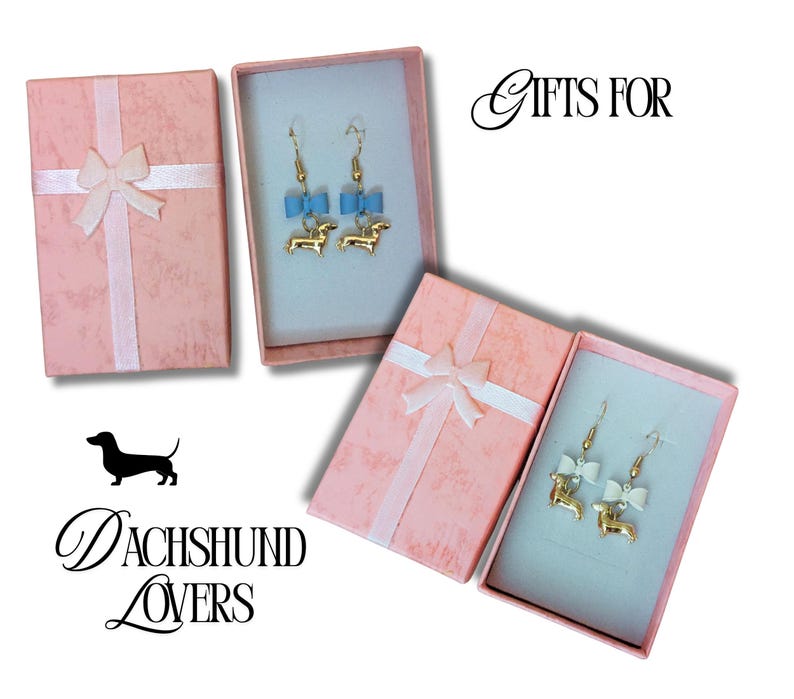May include: Pink gift boxes with white ribbon and bow, containing dachshund earrings. One pair has blue bows, the other white. The text "Gifts For" and "Dachshund Lovers" is also visible.