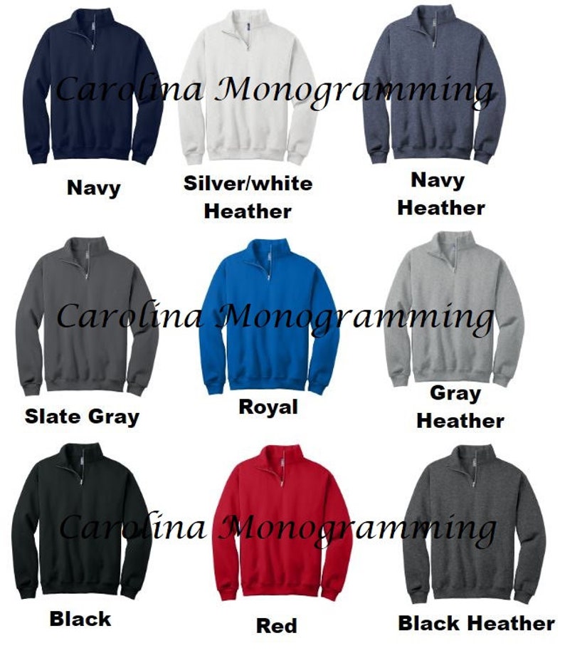 May include: A collection of quarter-zip sweatshirts in various colors, including navy, silver/white heather, slate gray, royal blue, gray heather, black, red, and black heather. Each sweatshirt features a zipper and the text "Carolina Monogramming".