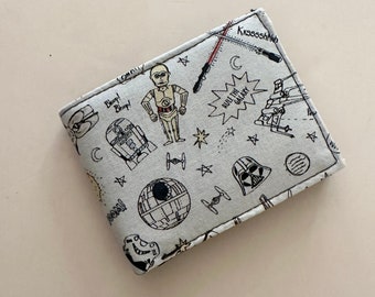 Bifold wallet made with white star war fabric