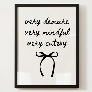 May include: Black and white printable art print with the text "very demure very mindful very cutesy" and a black bow.