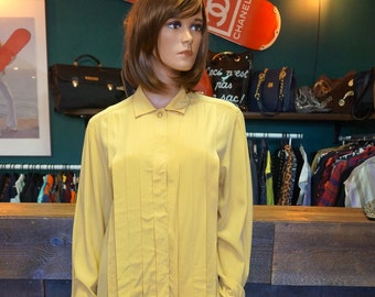 vintage Chanel blouse silk shirt yellow shirt blouse pleats chanel boutique dress tab material gold logged buttons cufflinks authentic