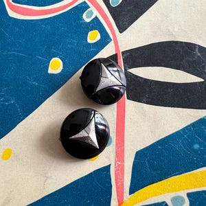 Vintage Button Clip-On Earrings: Upcycled Black & Silver Crest Jewelry