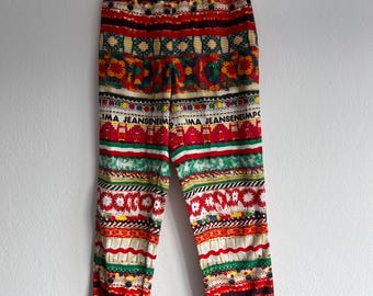 Vintage Moschino-jeans – veelkleurige bloemenprint, hoge taille, made in Italy jaren 90