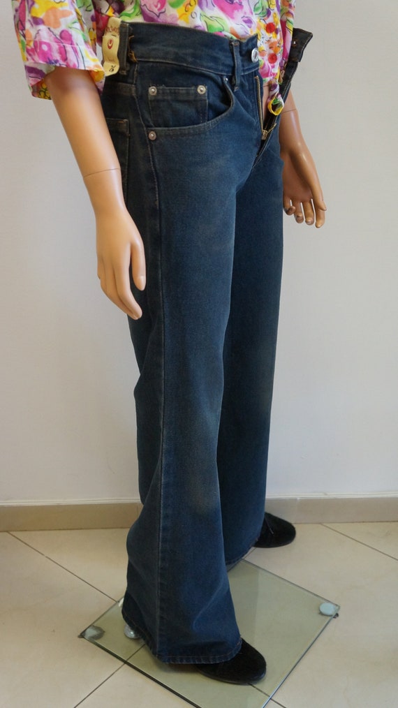 Jaren 70 Disco Flared Broek Dames, Zilver - De verkleedzolder, voor al uw  feestartikelen, accessoires, verhuur en verkoop van kleding, feestkleding  en kostuums voor uw themafeest of gala.