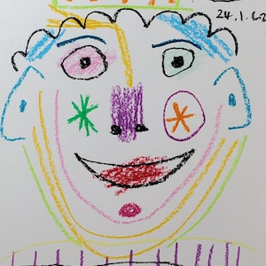 May include: Colorful crayon drawing of a face with a crown. The face has blue, green, yellow, orange, pink, and purple details. The drawing is signed "Picasso" with the date "24.1.62".