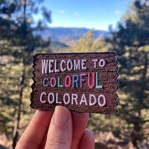 Colorful Colorado Welcome Sign Welcome to the Rocky Mountains Patch Adventure Awaits 3 x 2 Iron on Explorer Embroidered Badge image 1