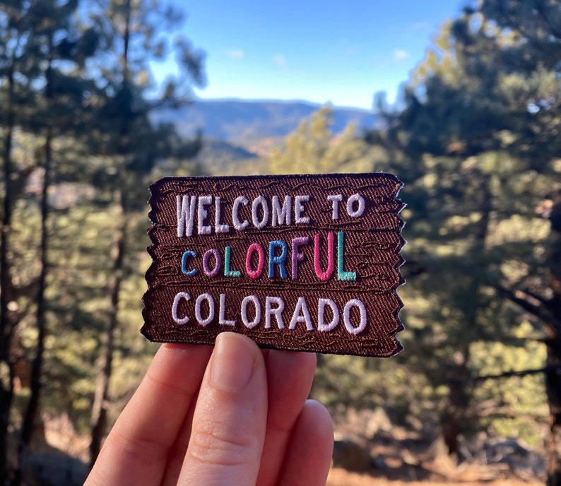 Colorful Colorado Welcome Sign Welcome to the Rocky Mountains Patch Adventure Awaits 3 x 2 Iron on Explorer Embroidered Badge image 1