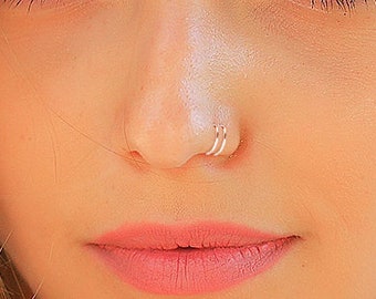 Girl With 2 Nose Piercing