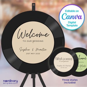 May include: A black vinyl record with a beige circle in the center. The circle has the text "Welcome to our wedding" and the names "Sophie & Martin" with the date "21st May 2025". The record is on a black easel.