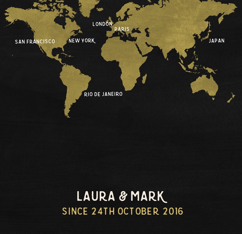 May include: A world map in gold against a black background, with major cities labeled. The names "Laura & Mark" and the date "24th October 2016" are printed below the map. The map is a decorative piece.