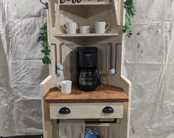 Stylish Corner coffee station crafted from a vintage door, with handy "k" cup racks, this corner coffee shelf fits nicely in any corner.