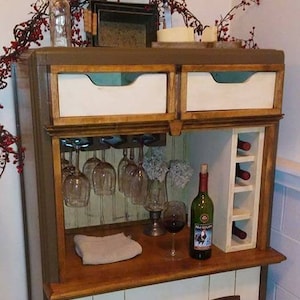 Rolling wine bars - made from upcycled dressers -  with casters - wine storage - wine glass hangers - an two nice drawers for accessorie.