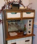 Rolling wine bars - made from upcycled dressers -  with casters - wine storage - wine glass hangers - an two nice drawers for accessorie. 