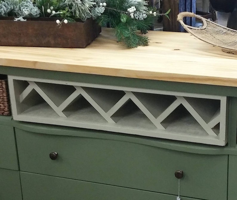 This recycled dresser makes the perfect kitchen island-With a handy wine rack crafted right in front and matching baskets-and slick design image 5