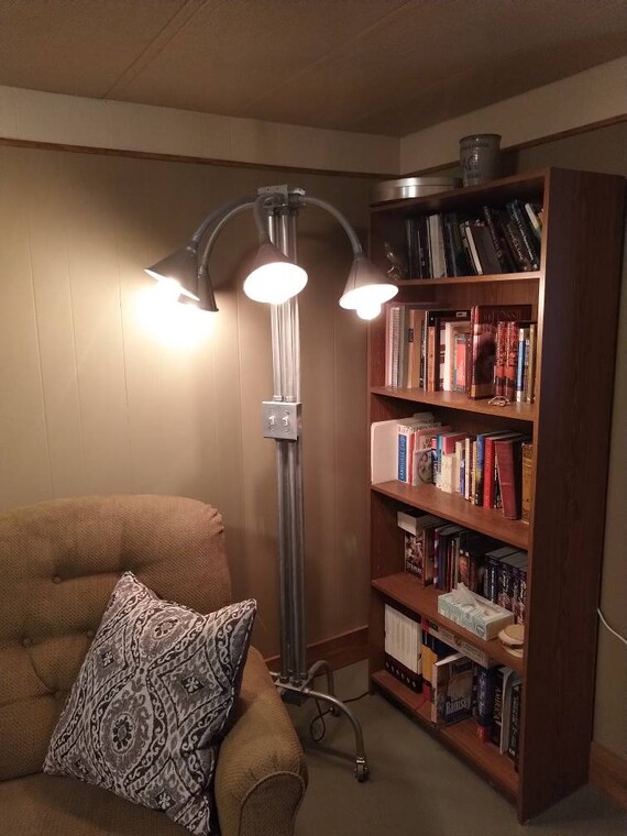 One of a kind!! Floor lamp, made from Galvanized electrical conduit, Galvanized flexible funnels and steel boxes. For a very unique look!!!