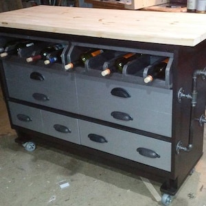 This recycled dresser, makes the perfect kitchen island! With 4 casters to go anywhere this is it! A place for all your kitchen island decor