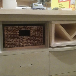 This recycled dresser makes the perfect kitchen island-With a handy wine rack crafted right in front and matching baskets-and slick design image 10