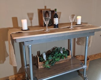 Industrial Kitchen Island - is a unique one - with a hidden butterfly leaf - 4 casters that lock - a convent lower shelf  & kitchen storage