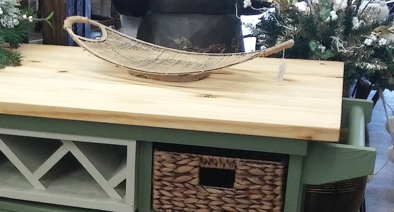 This recycled dresser makes the perfect kitchen island-With a handy wine rack crafted right in front and matching baskets-and slick design image 7