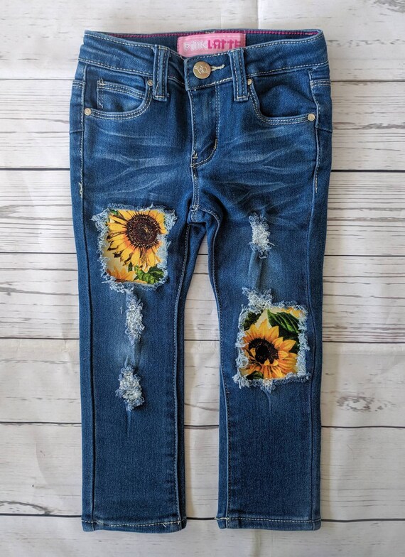 ripped jeans with flowers