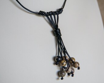 Crazy horse stone on black leather necklace