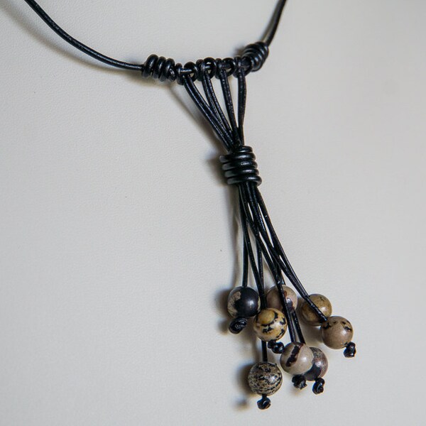Crazy horse stone on black leather necklace