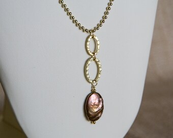 Iridescent brown freshwater pearl pendant on gold colored beaded chain necklace