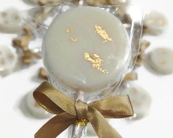 Ivory and gold leaf lollipops with satin bows